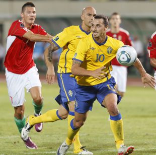 Budapest, Hungary - September 2, 2011: Swedish Zlatan Ibrahimovic (10) and Daniel Majstorovic (M), Hungarian Adam Pinter (L) during Hungary vs. Sweden (2:1) UEFA Euro 2012 qualifying game at Puskas Stadium on September 2, 2011 in Budapest,
